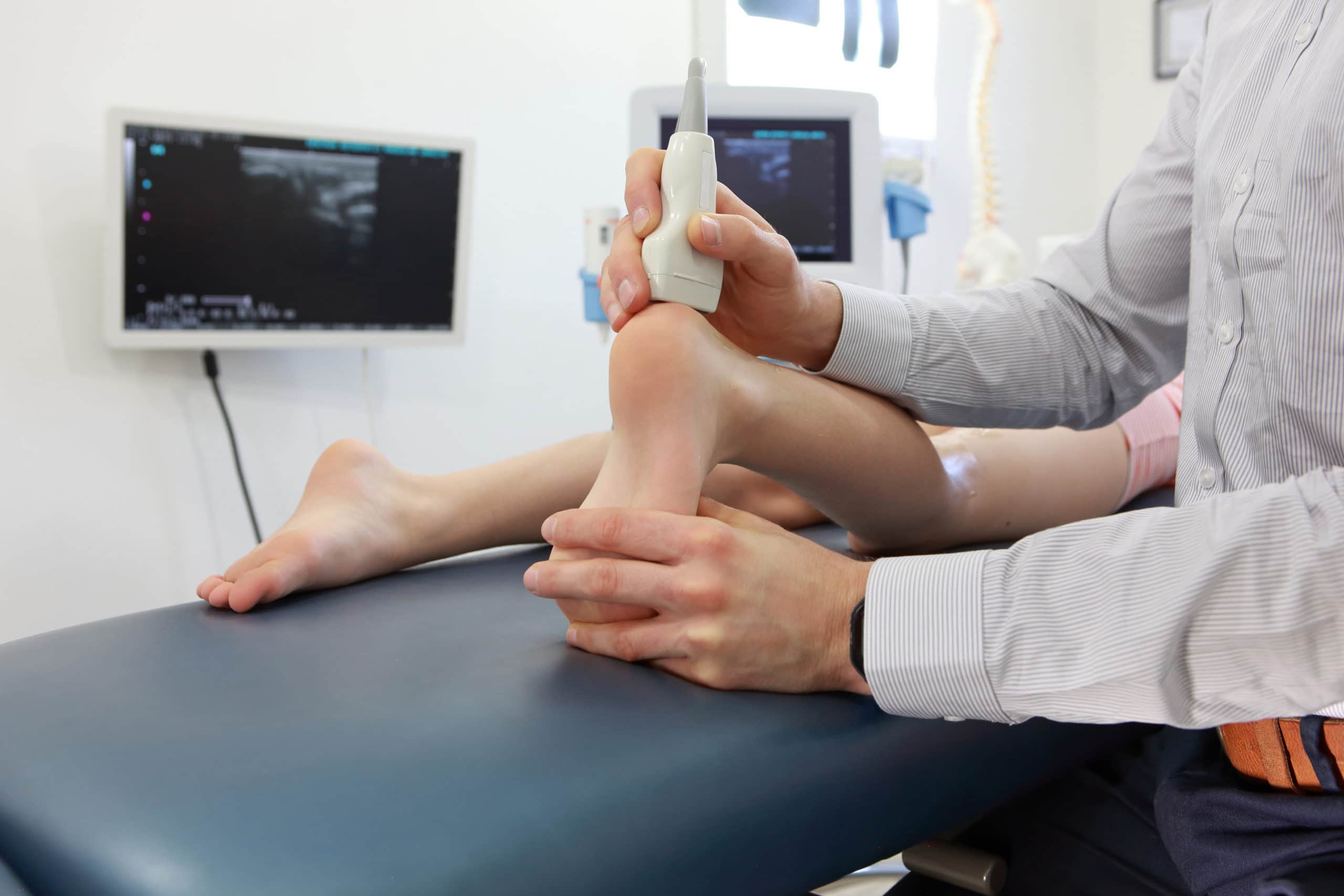 ultrasound of caucasian child's heel - diagnosis